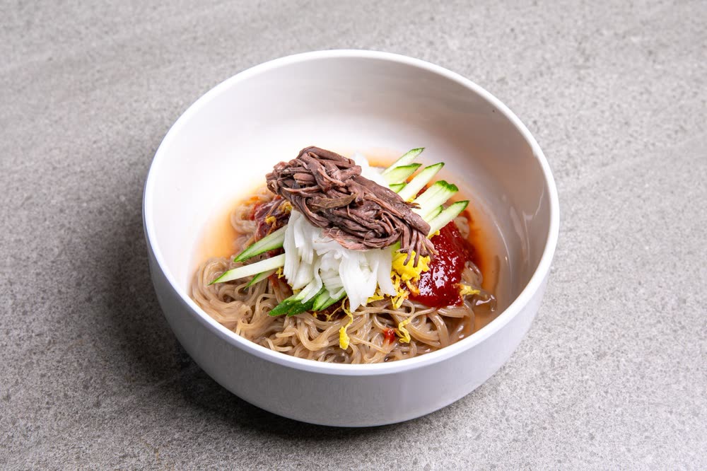 Spicy Korean Beef Naengmyeon (한우 사골냉면 (비빔)) — Sides at Hanwoodaum Hongdae, premium Hanwoo Korean BBQ in Seoul
